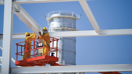 engineers on crane maintenance work
